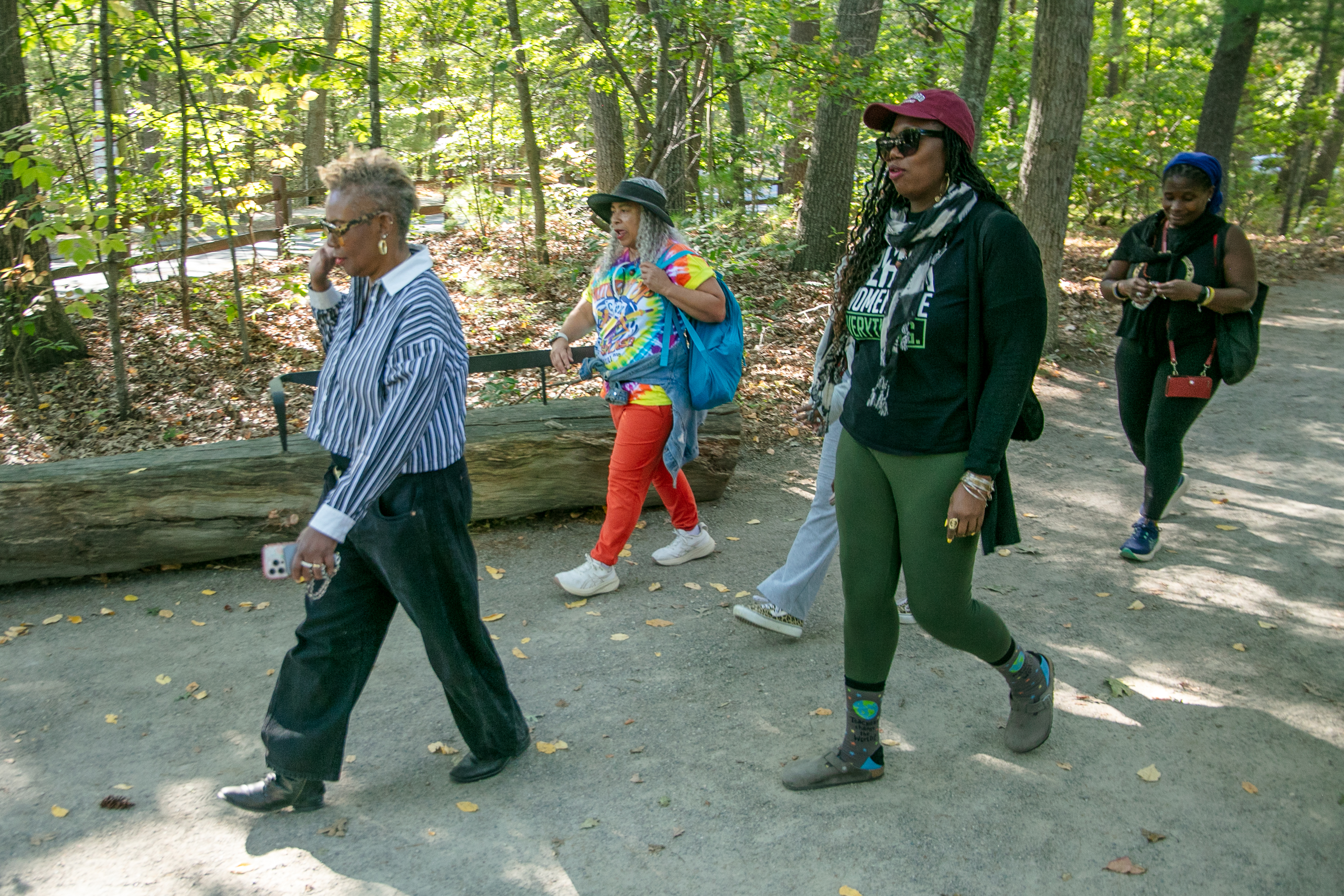 Discovering Black Walden retreat attendees walking a wooded Concord trail